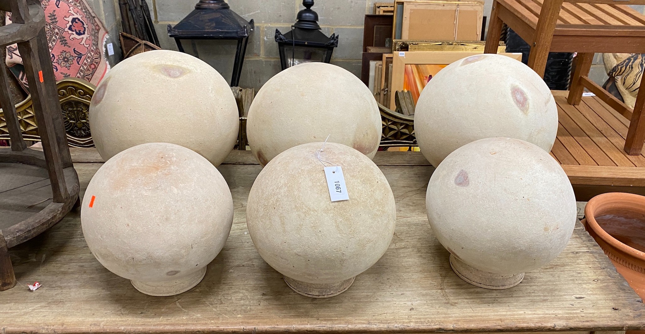Six faux stone ball finials, largest height 38cm
